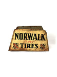 vintage signs Norwalk tires stand back