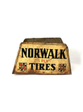 vintage signs Norwalk tires stand back